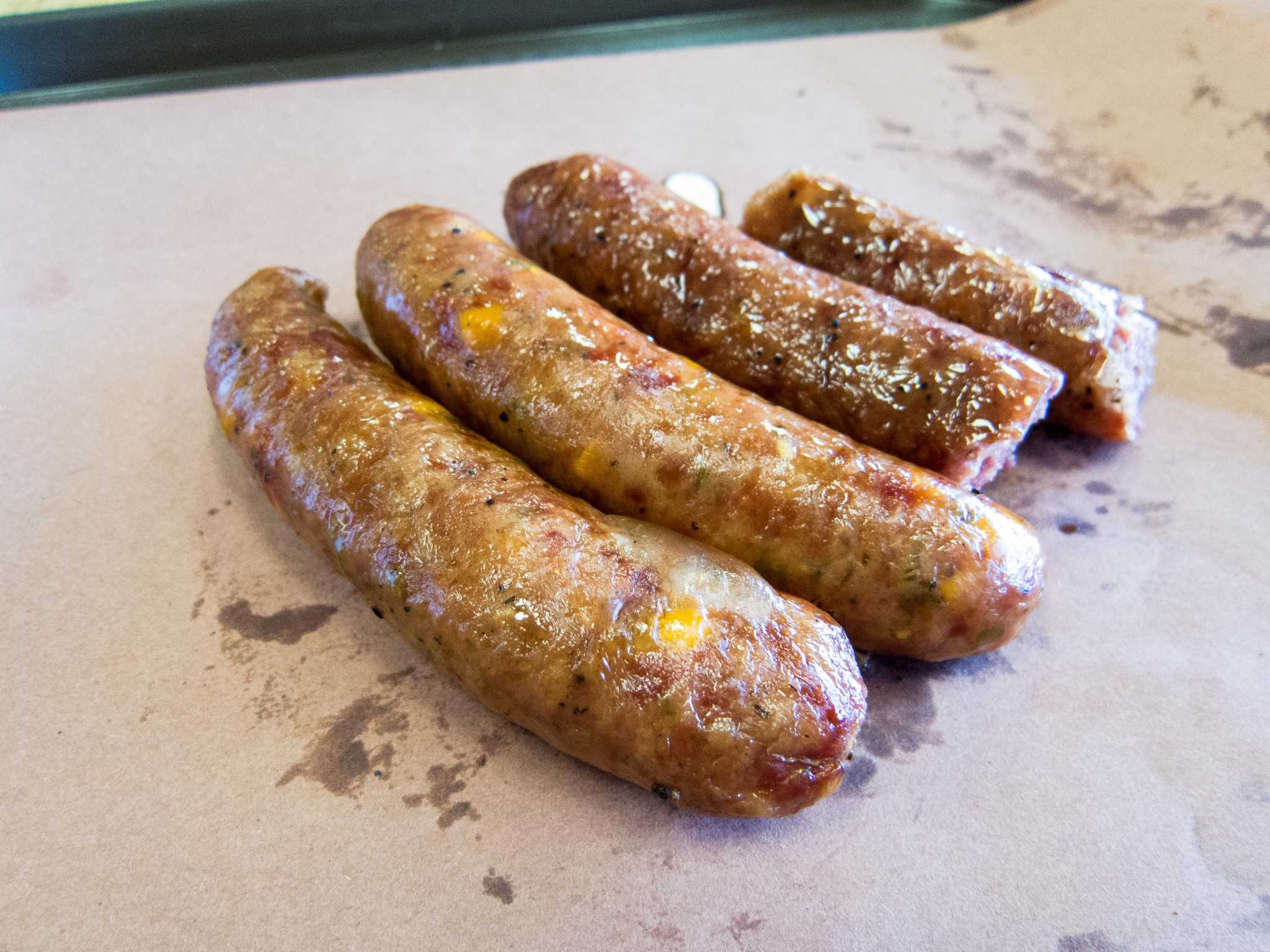 Central Texas scorching guts-style sausage served in Houston