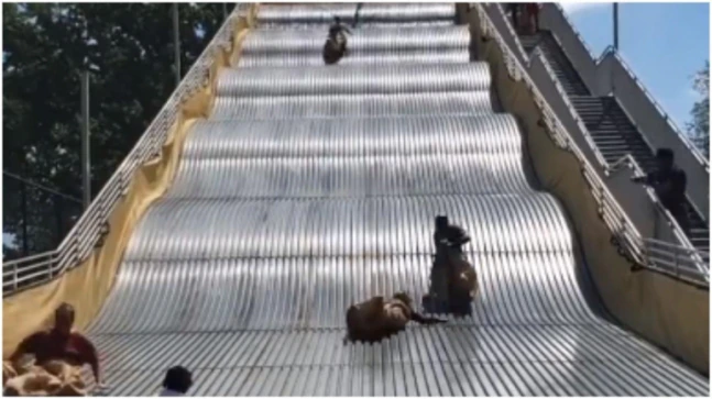 This video of an enormous bumpy slide at an amusement park within the US has baffled netizens