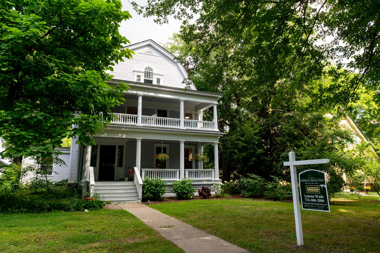 Burns Park dwelling with 2-story porch, well-kept woodwork is slice of Ann Arbor historical past