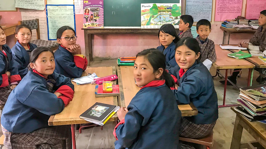 Retired Mid North Coast teacher supplies books, helps set new learning practices in Bhutan