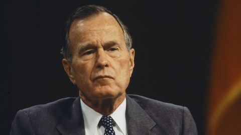 Former president George H.W. Bush attends the inaugural conference at the Baker Institute for Public Policy at Rice University in Houston, Texas, on November 13, 1995. 