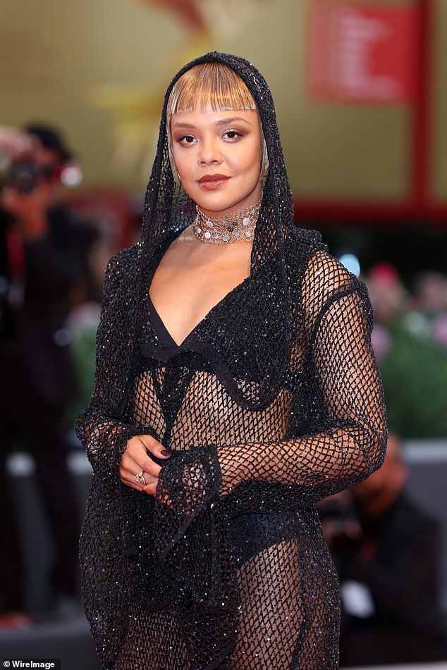 Tessa Thompson exhibits off her impeccable type in a blinding fishnet ensemble on the Blonde premiere