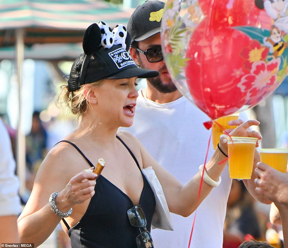 The booziest place on Earth! Kate Hudson and fiancé Danny Fujikawa take the sting off at Disneyland