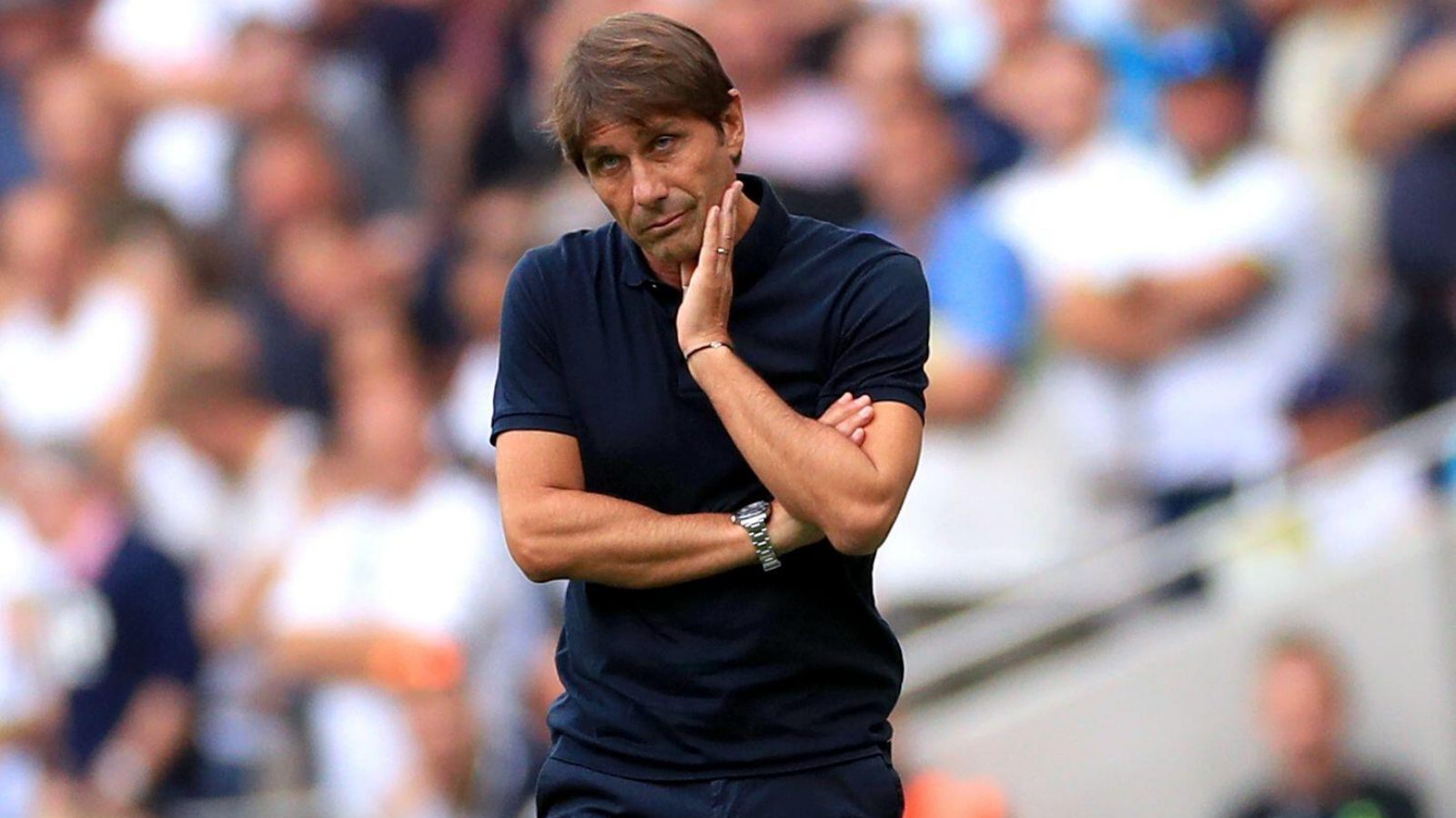 Tottenham manager Antonio Conte watches his side face Fulham.