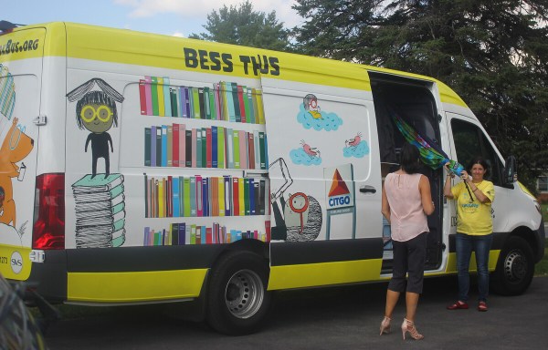 Bess the Book Bus is parked and open. 