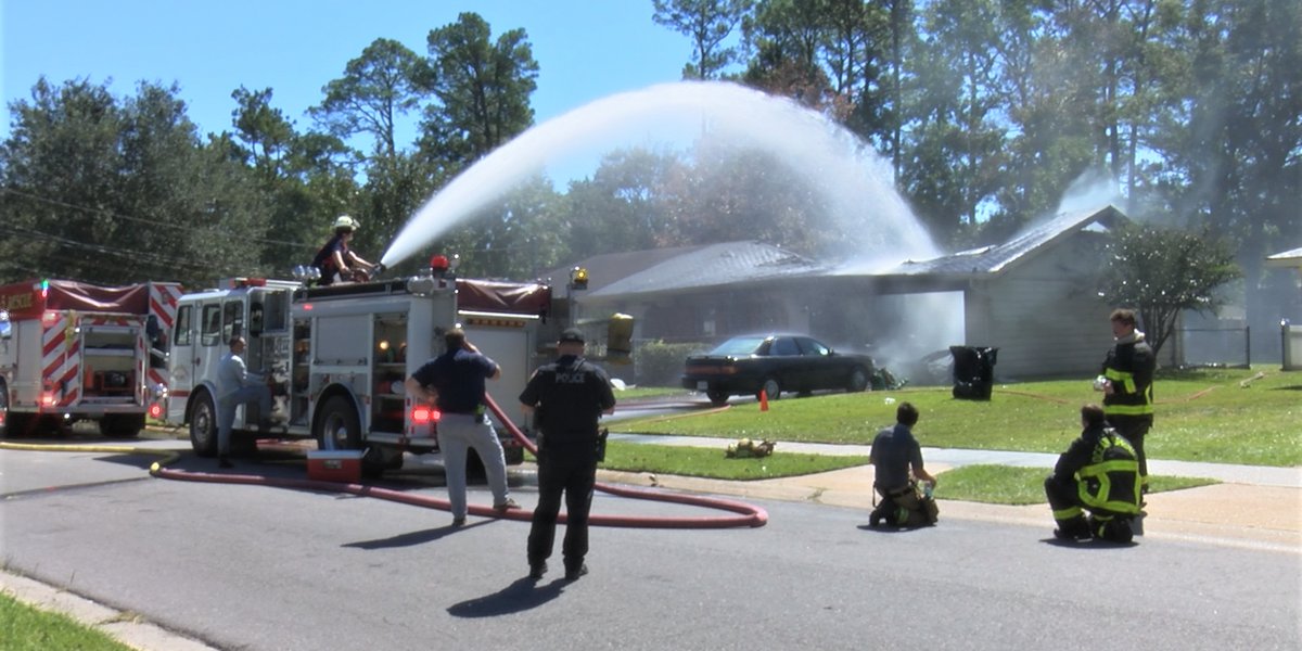 Ocean Springs dwelling catches fireplace