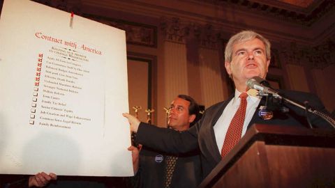 Speaker of the US House of Representatives Newt Gingrich(R-GA), holds up a copy of the  