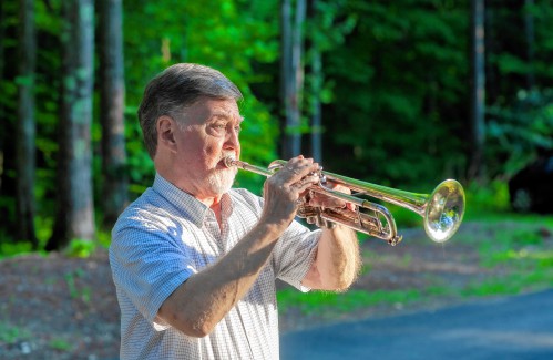 The 24 notes that come from Peter Clarke’s trumpet each summer possess a lasting effect