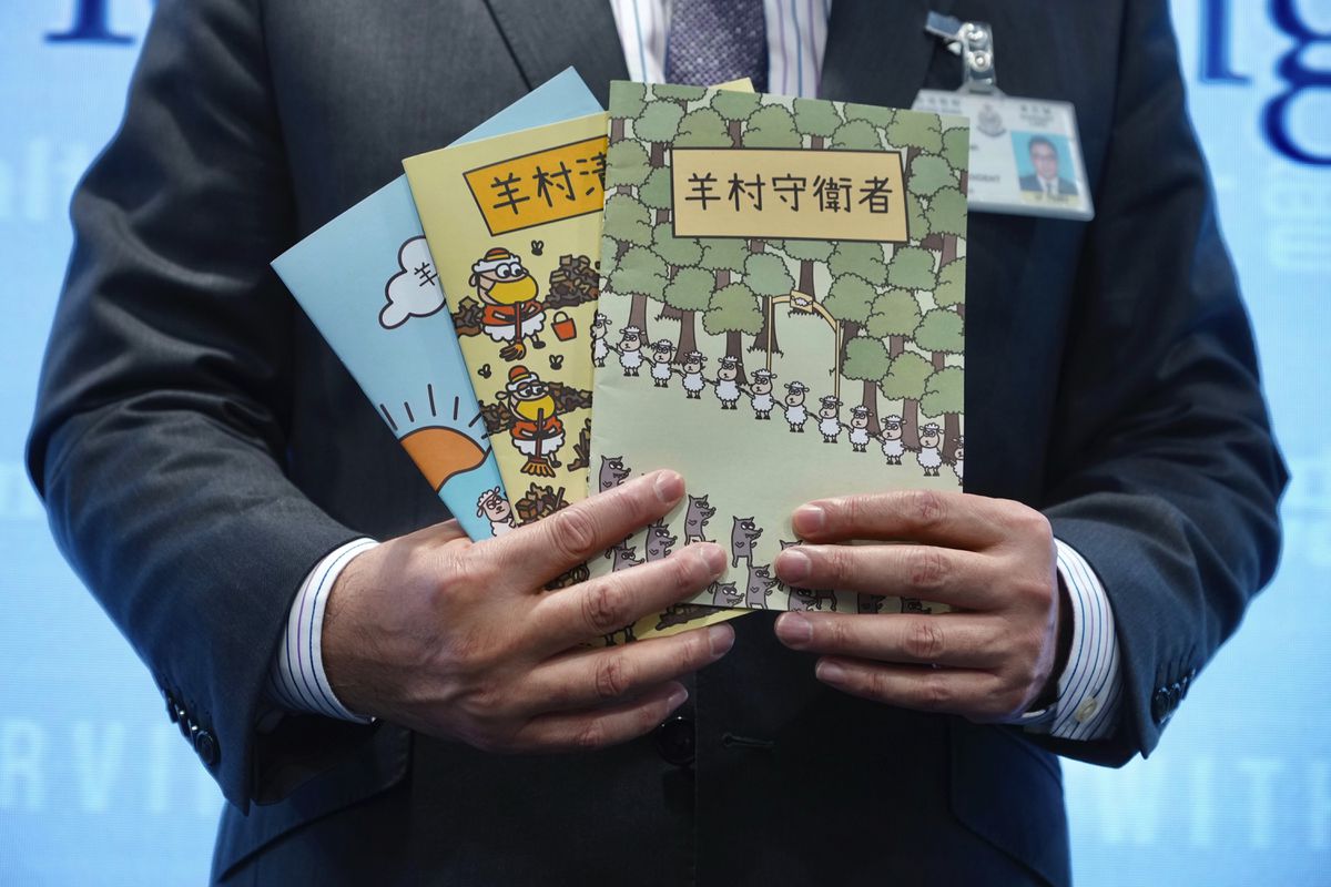 5 in Hong Kong jailed over ‘seditious’ kids’s books that includes sheep battling wolves