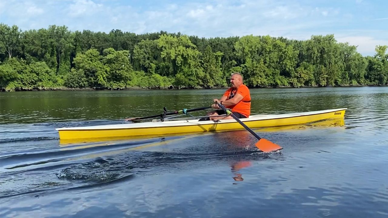 Retired firefighter fights impairment via rowing