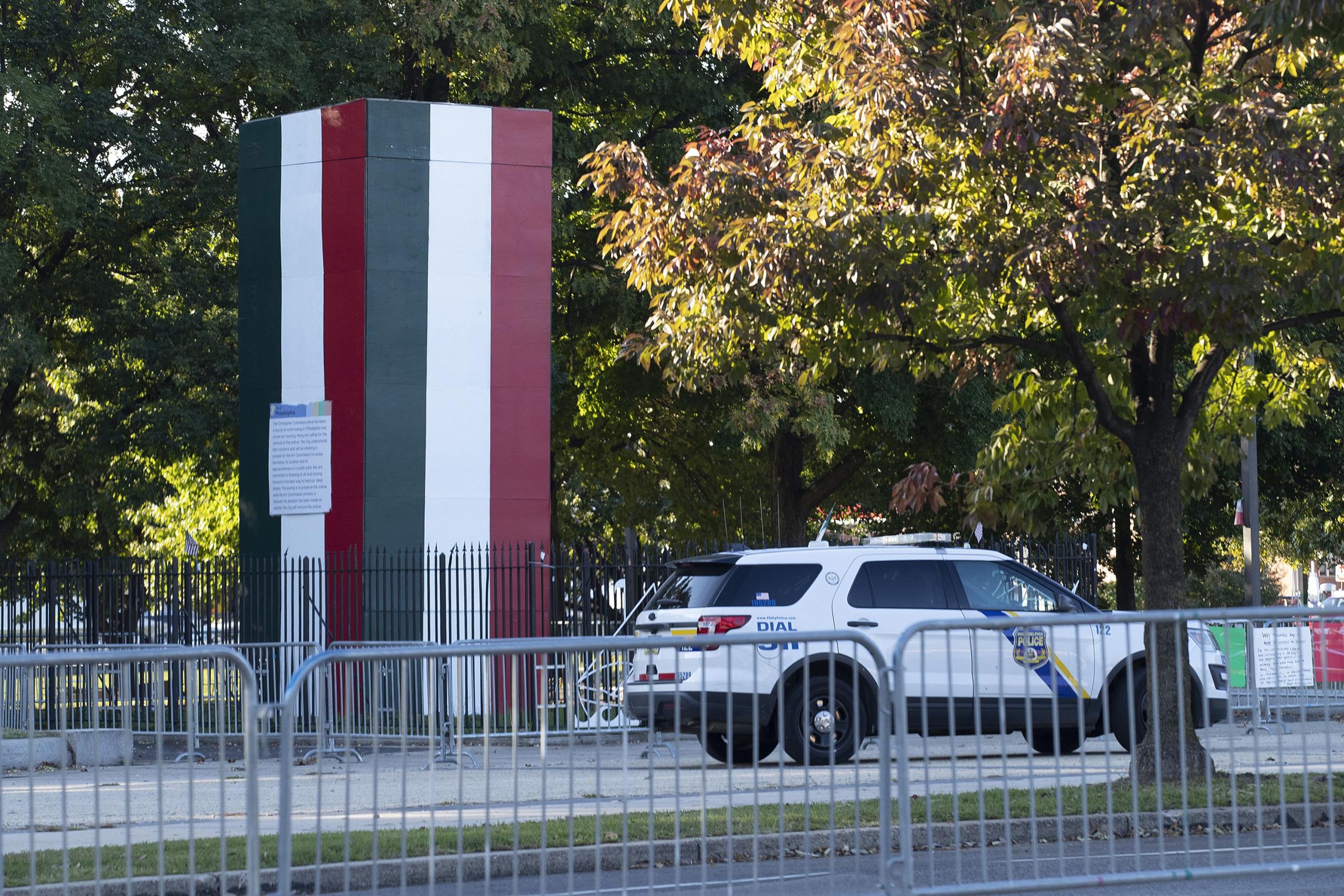 Field overlaying Columbus statue sports activities colours of Italian flag