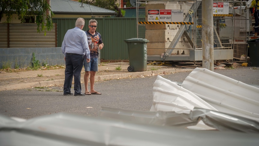 Roof torn off house, powerlines downed as extreme storm labelled ‘mini twister’ hits Alice Springs