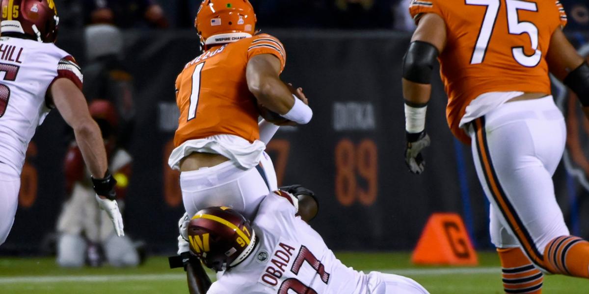 Bears’ Justin Fields does push-ups after Dante Pettis landing