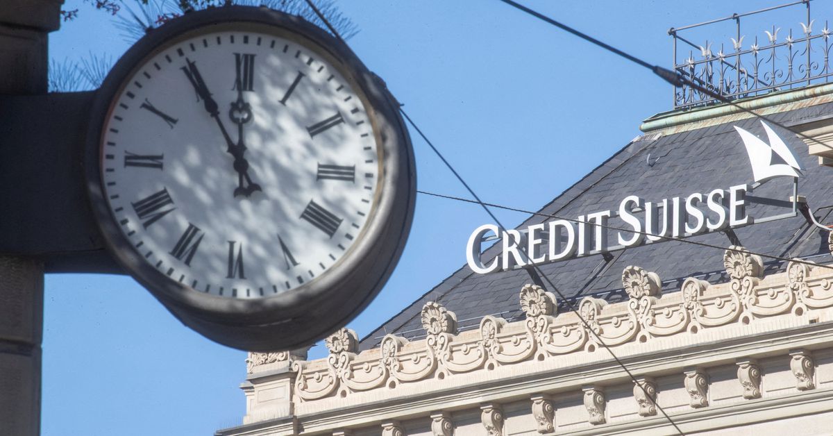 Credit score Suisse pays down debt to calm investor fears