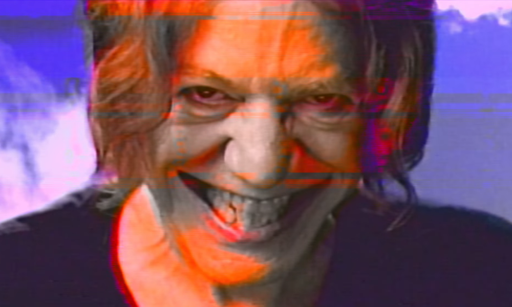 Danny Elfman Releases VHS Style Music Video for Boy Harsher Remix of "Happy" [Video]