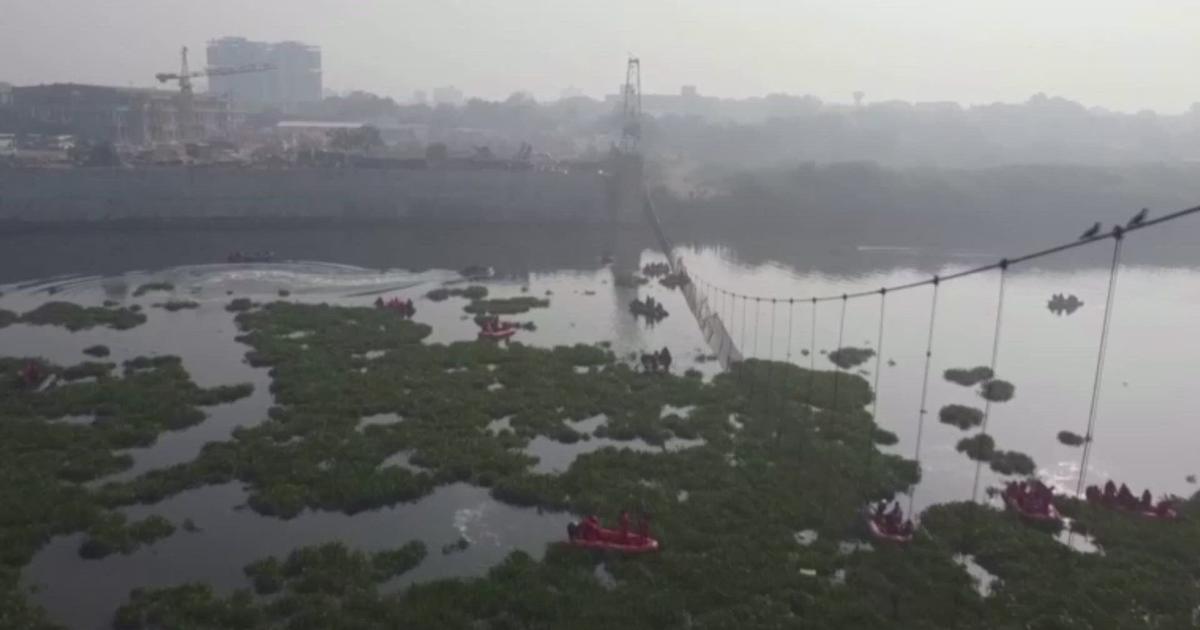 Drone footage exhibits rescuers working at India bridge collapse website