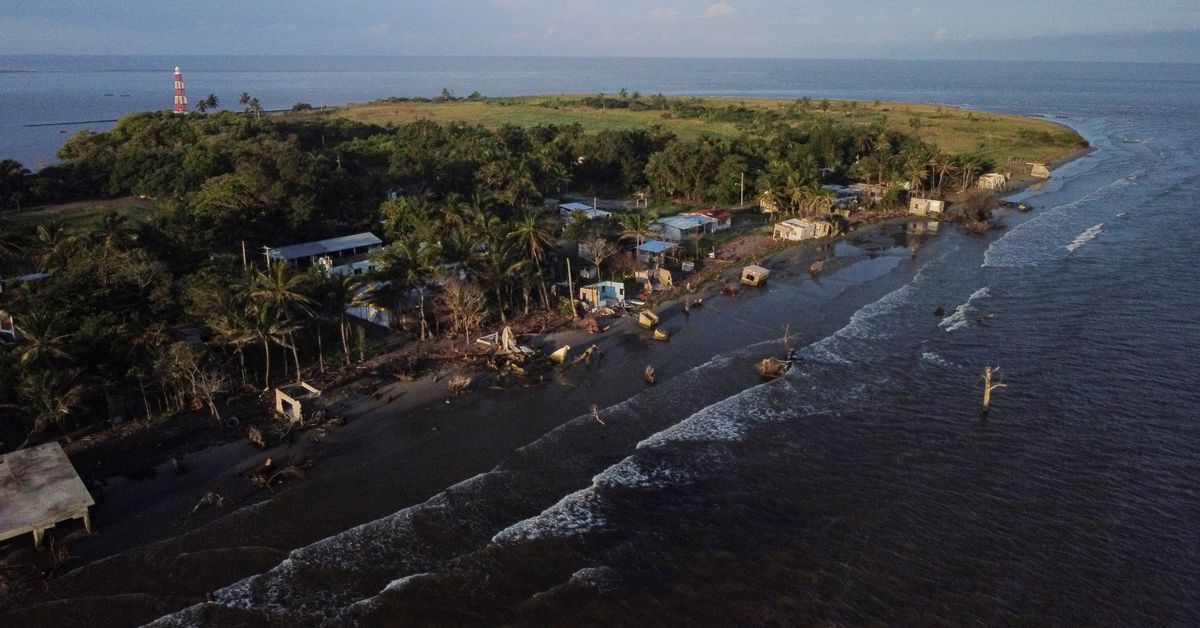 Mexican village blames local weather change as sea swallows its houses