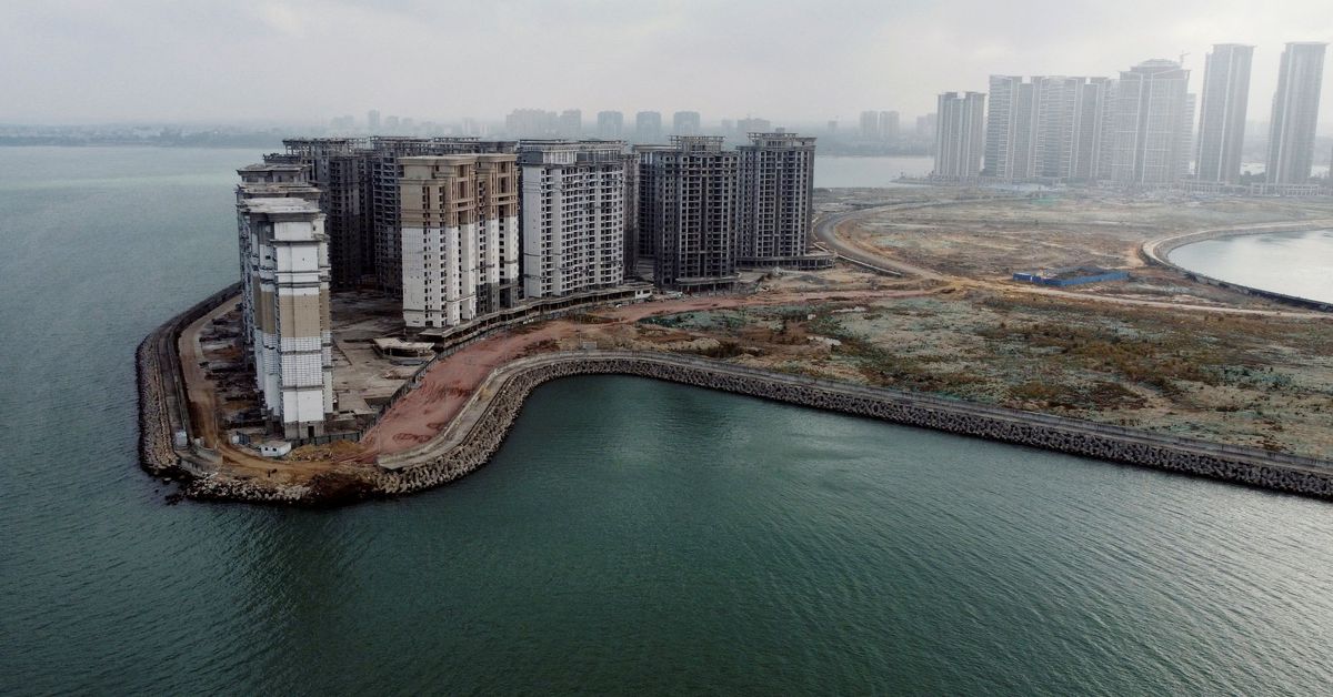 Authorities flip seized house towers at Evergrande’s resort island to rental, business use