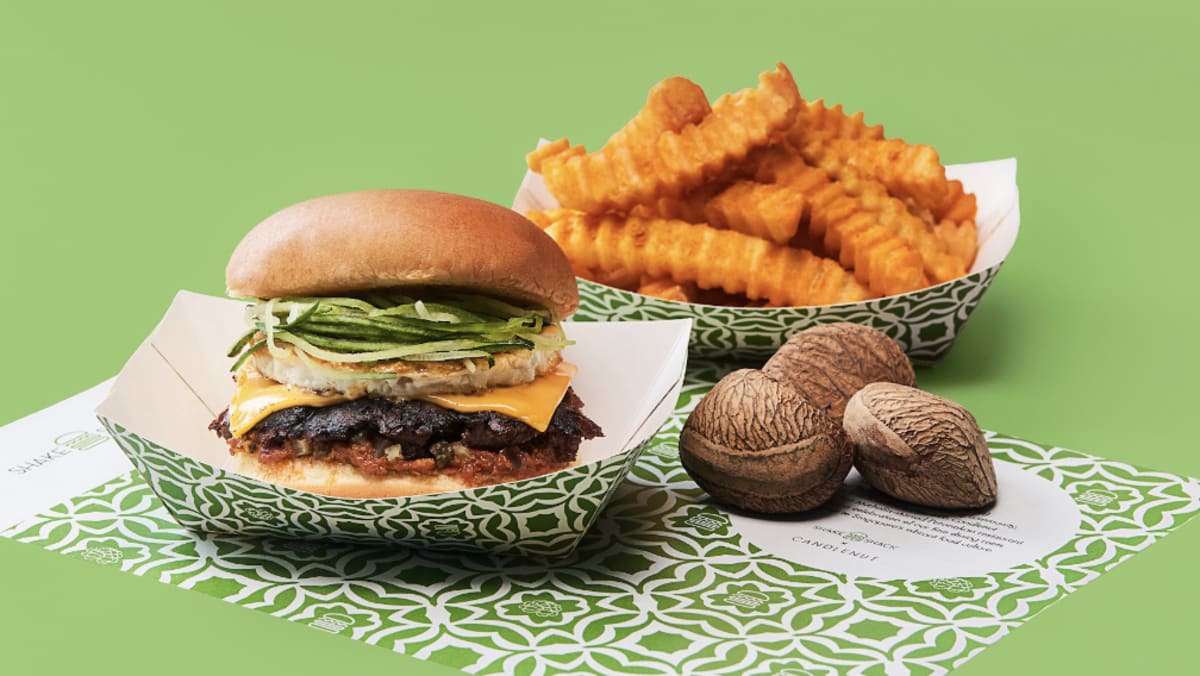 In the future solely: Buah keluak burger and curry fries at Shake Shack Singapore from Michelin-starred Candlenut