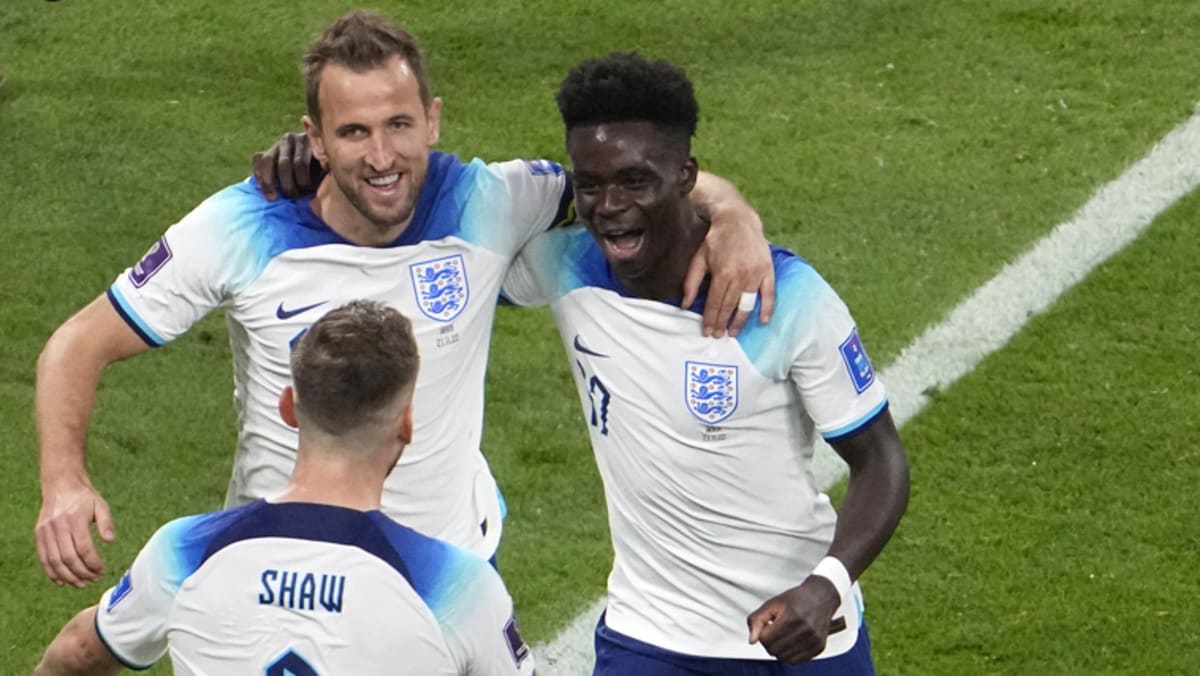 Dominant England hit six previous plucky Iran in World Cup Group B opener