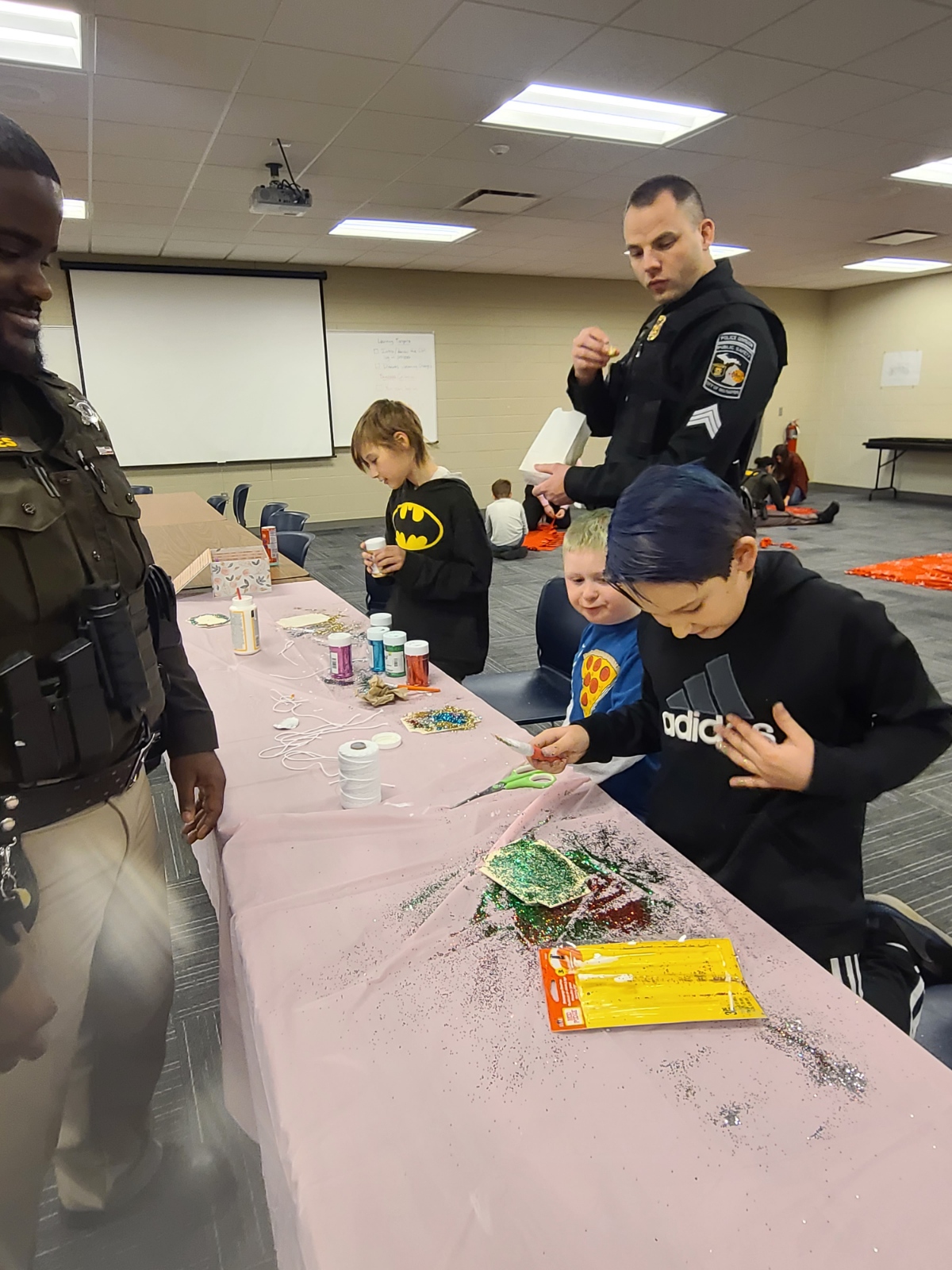 Huge Rapids first responders go Christmas purchasing with youths