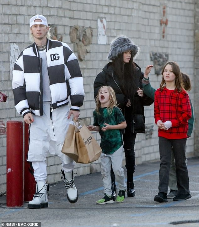 Megan Fox will get in last-minute Christmas purchasing with MGK and her sons in Malibu 