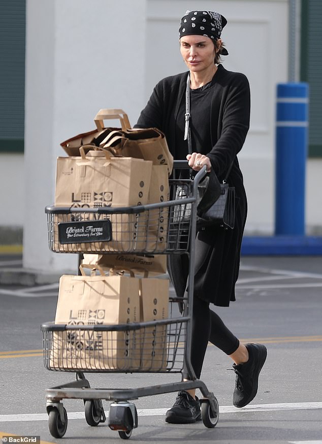 Lisa Rinna showcases her informal sense of favor in fitted leggings on a grocery run in Beverly Hills