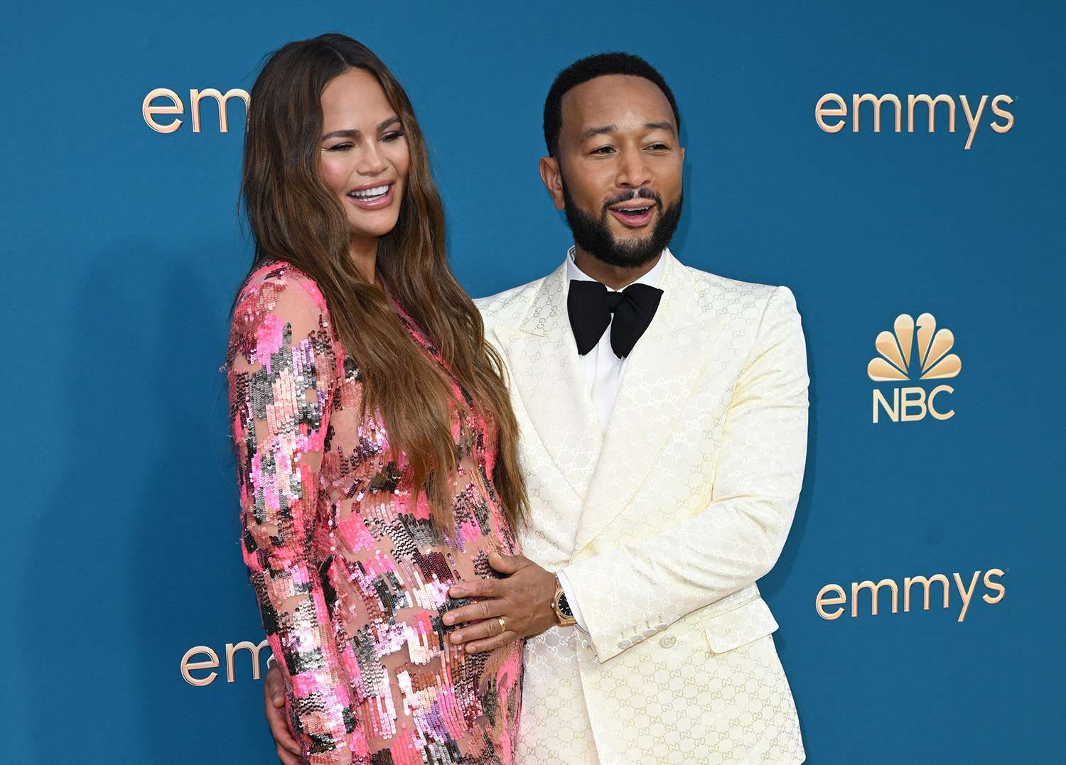 Pregnant Chrissy Teigen and John Legend Pose Don Christmas Sweaters