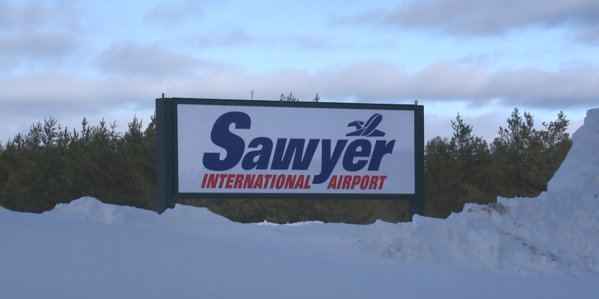 Sawyer Worldwide Airport clearing snow forward of extra vacation journey