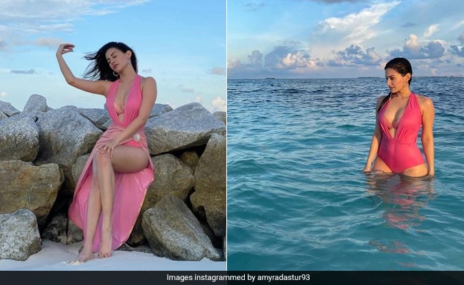 Amyra Dastur’s “Sunkissed” Maldives Type Contains A Beautiful Pink Swimsuit In The Sea