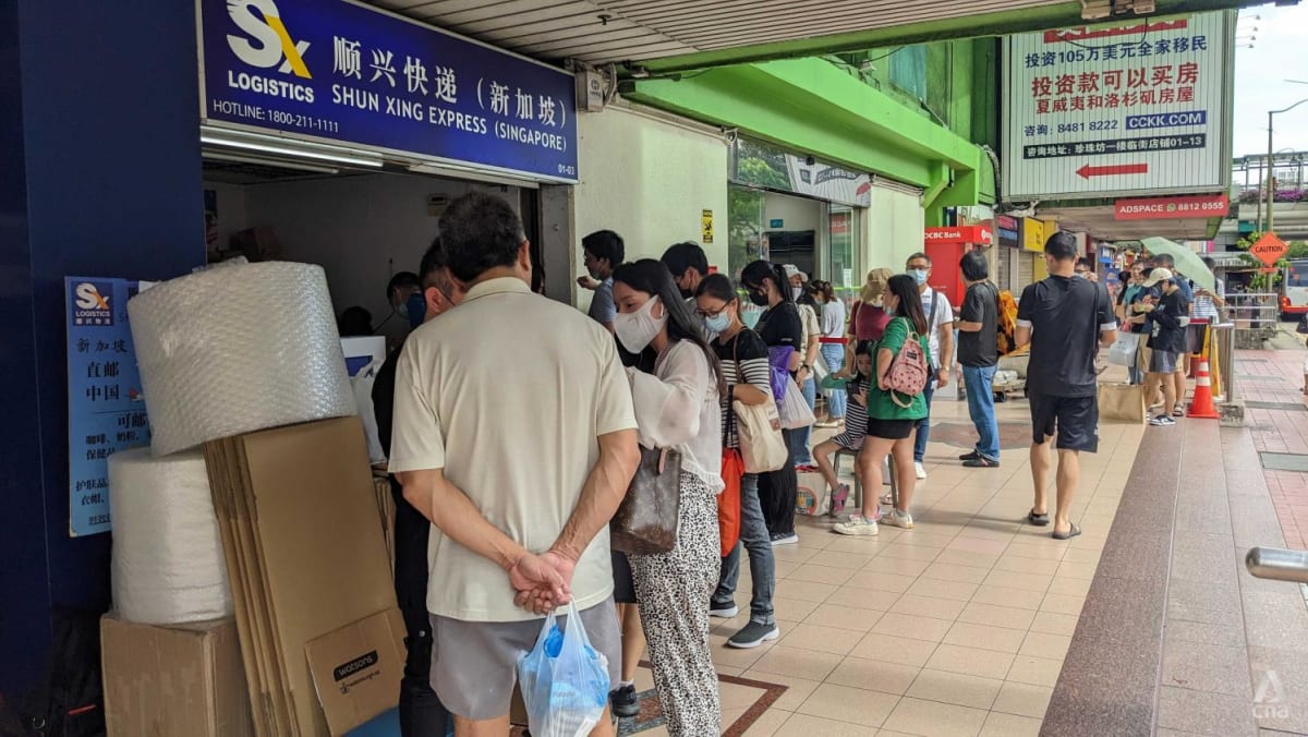 Nervous China nationals in Singapore queue to ship Panadol to family again house