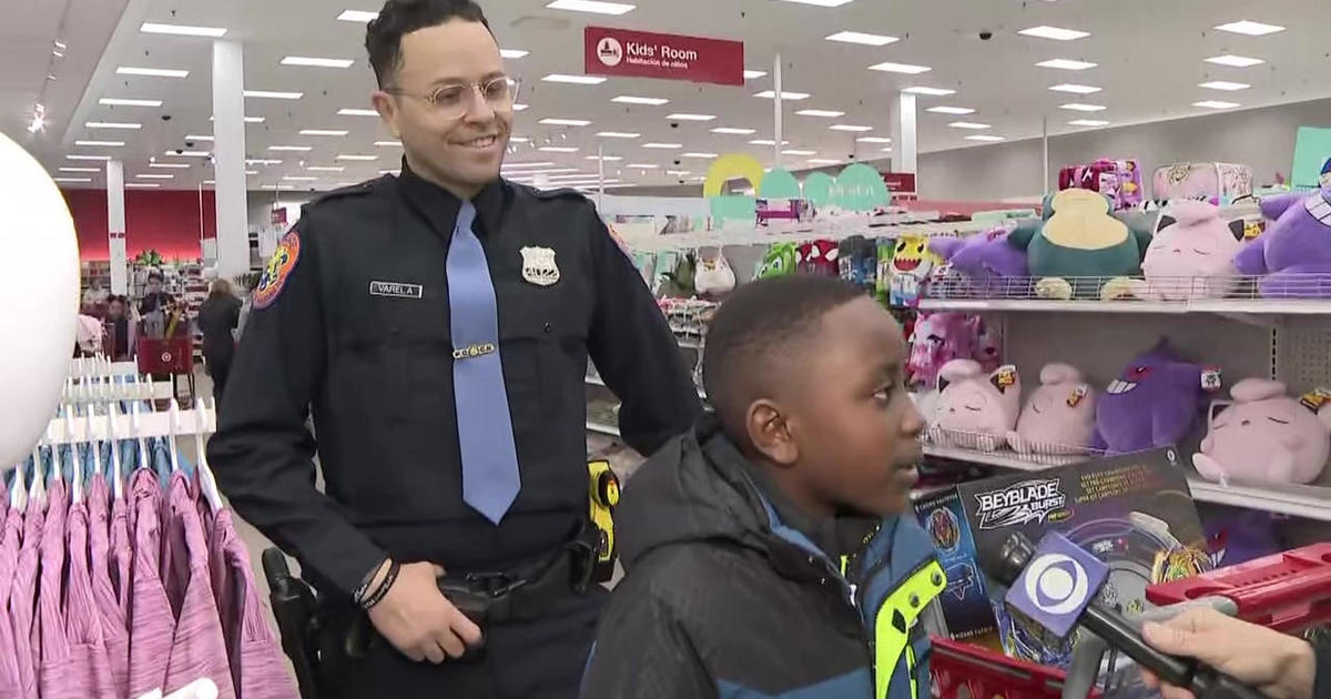 Kids from households going through adversity handled to superhero buying spree, courtesy of Nassau cops