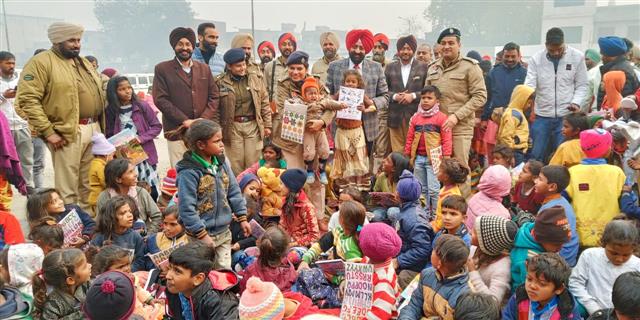 CP distributes books, sneakers amongst needy : The Tribune India