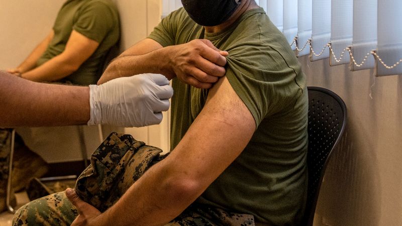 Pentagon formally rescinds Covid-19 vaccine requirement for troops