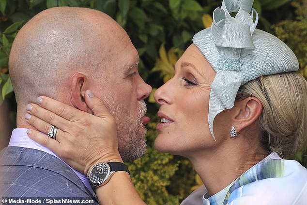 A VERY racy show! Zara and Mike Tindall pack on the PDA and lark about