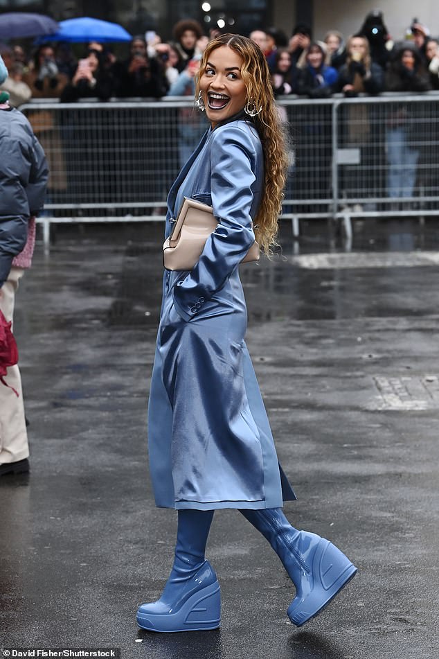 Rita Ora exhibits off her impeccable model in an attention grabbing blue ensemble at PFW