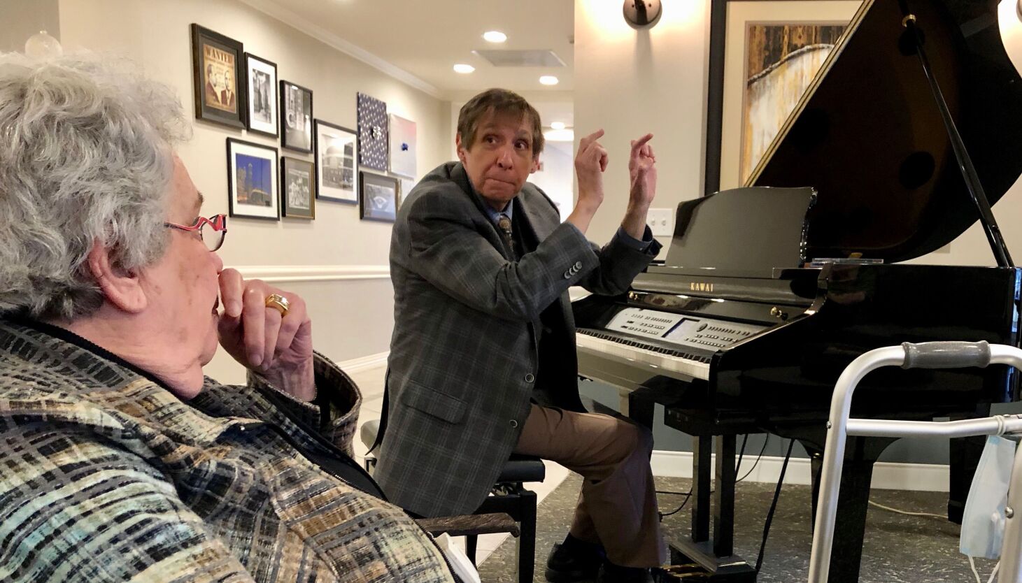 Jim Kendros brings music and philosophy to aged residents at Belmont Village