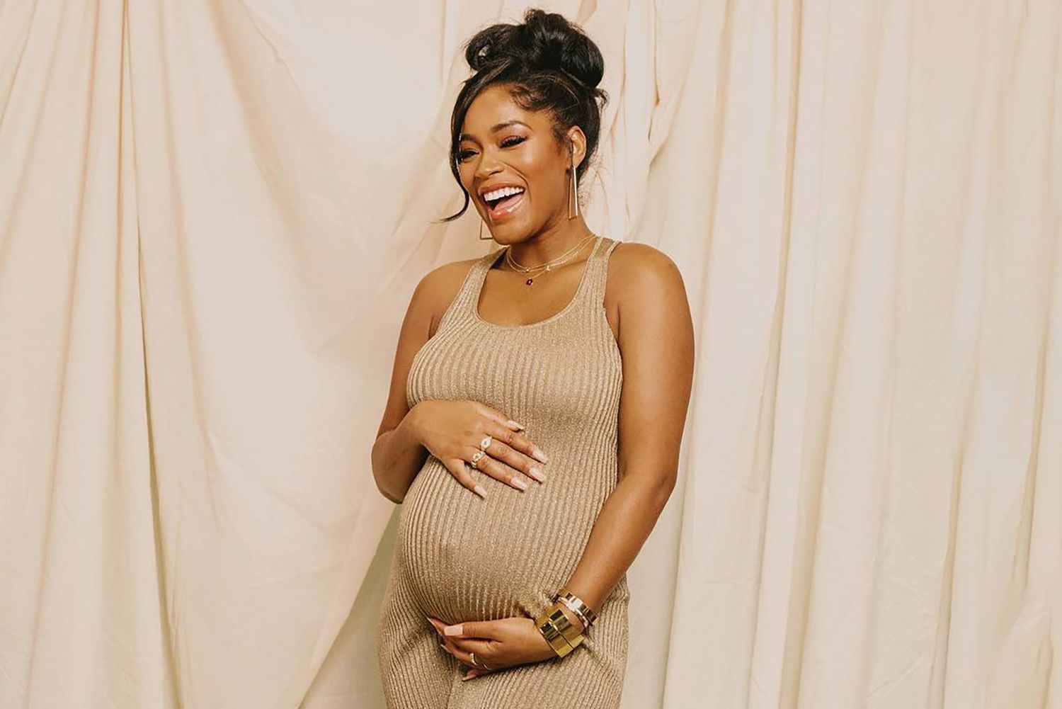 Pregnant Keke Palmer Cradles Her Child Bump in Maternity Photoshoot