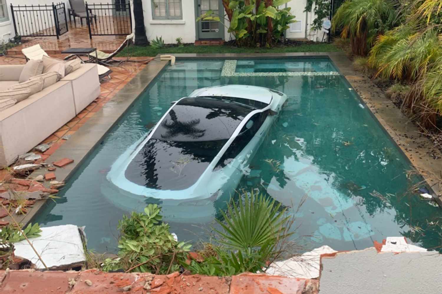 2 Adults and 4-12 months-Previous Boy Rescued After Tesla Crashes into Pool