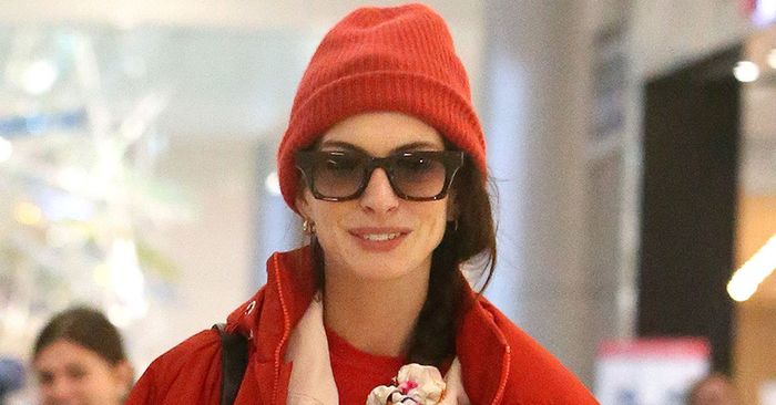 Anne Hathaway’s Journey Coat Does Double Responsibility as a Blanket