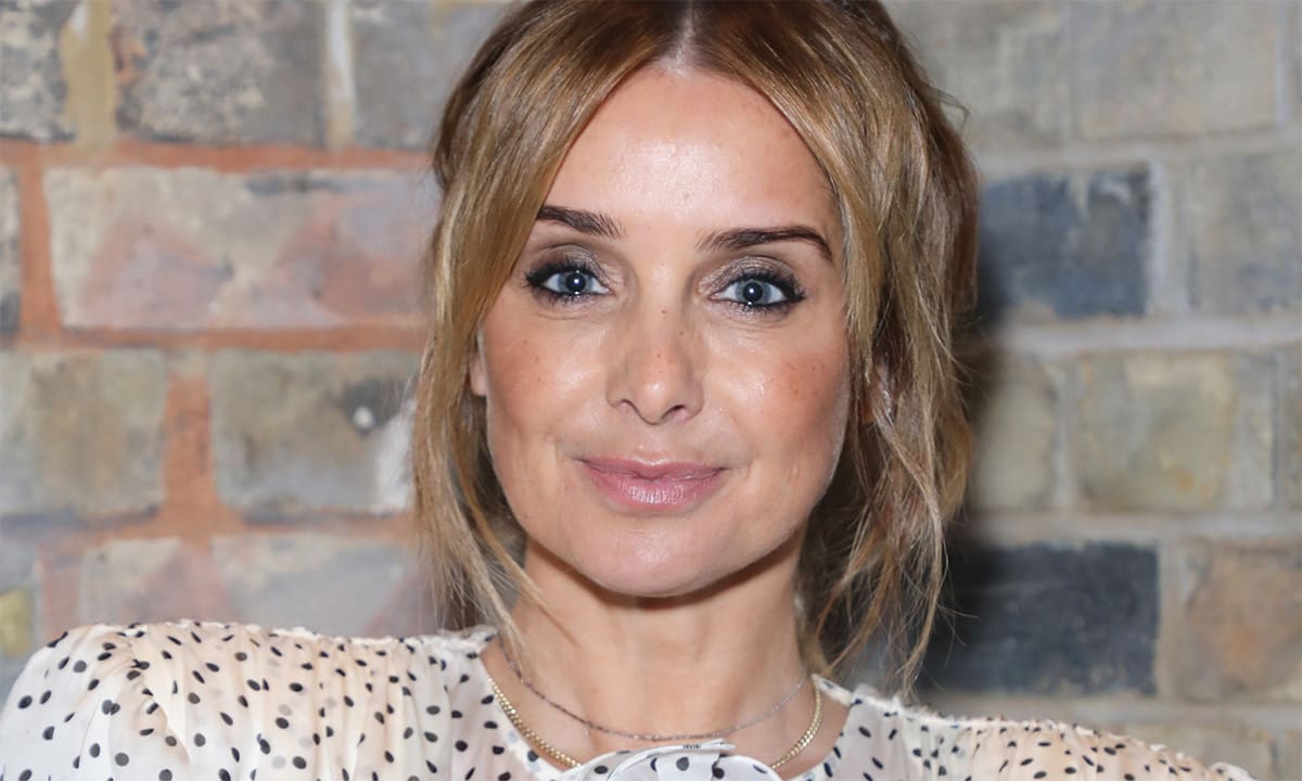 Louise Redknapp turns up the warmth in backless crop high – and it is best to see her abs